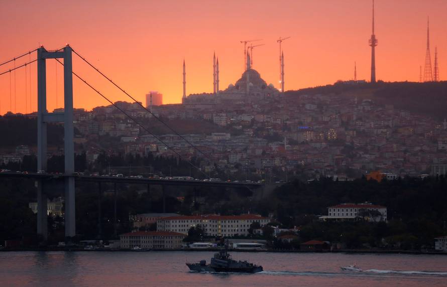 Russian Navy's Tarantul-class corvette Ivanovets is escorted by a Turkish Navy Coast Guard boat as it sets sail in the Bosphorus