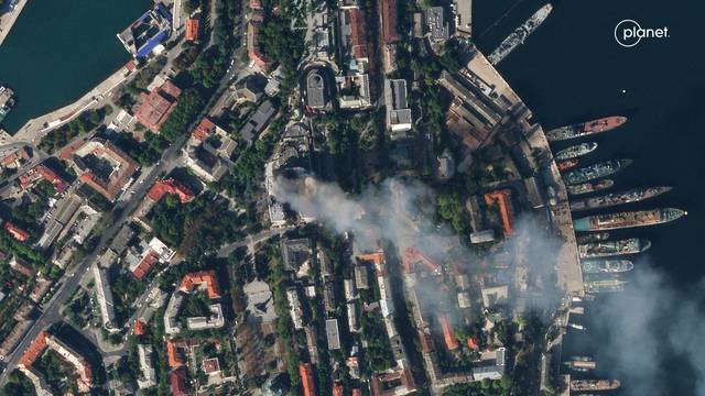 Satellite imagery shows smoke billowing from a Russian Naval HQ after Ukrainian strike