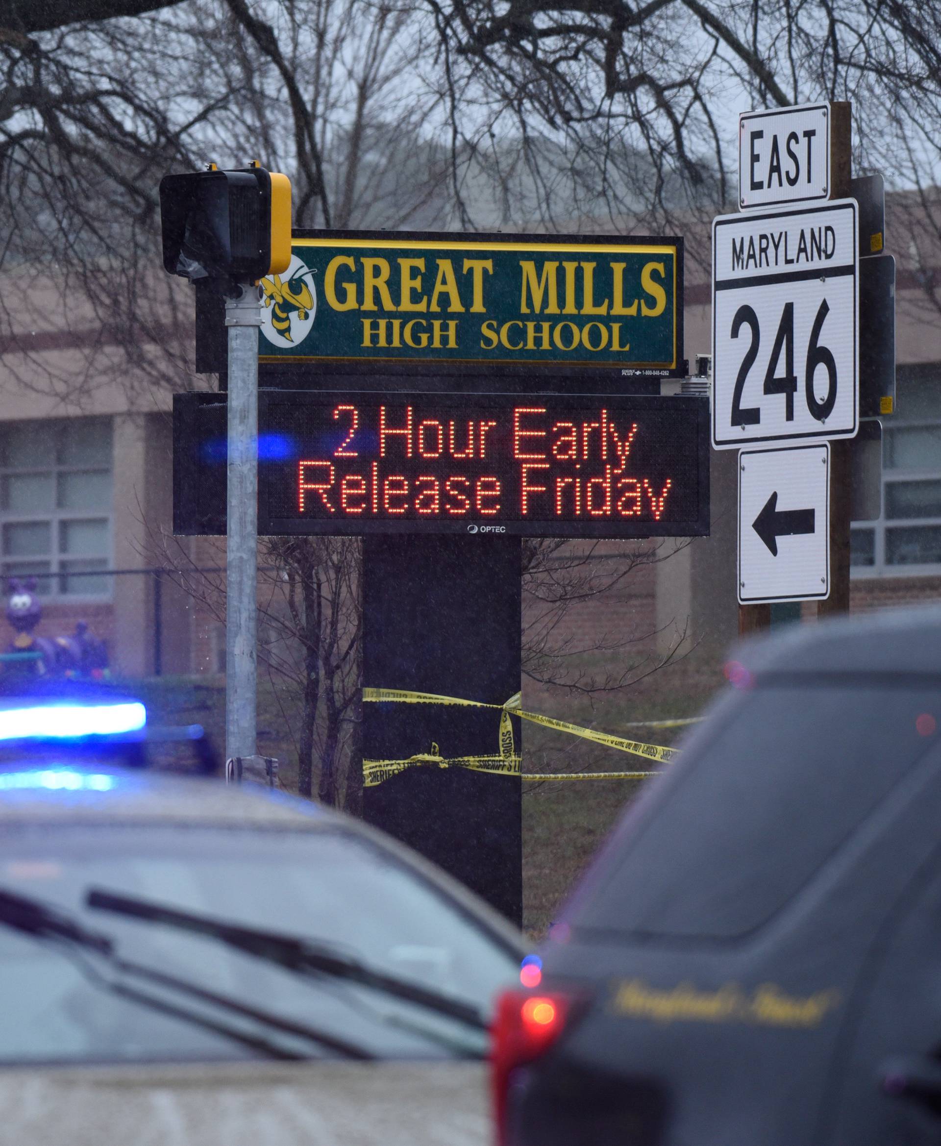 Law enforcement vehicles are seen outside the Great Mills High School following a shooting on Tuesday morning in St. Mary's County, Maryland