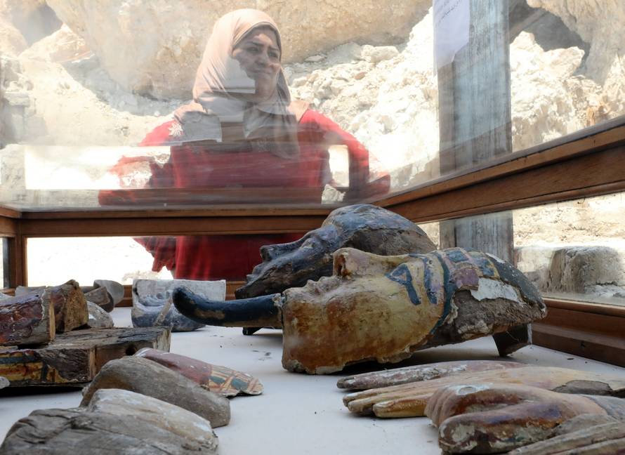 Artefacts from the recently discovered tomb of Amenemhat, a goldsmith from the New Kingdom, are on display at the Draa Abu-el Naga necropolis near the Nile city of Luxor