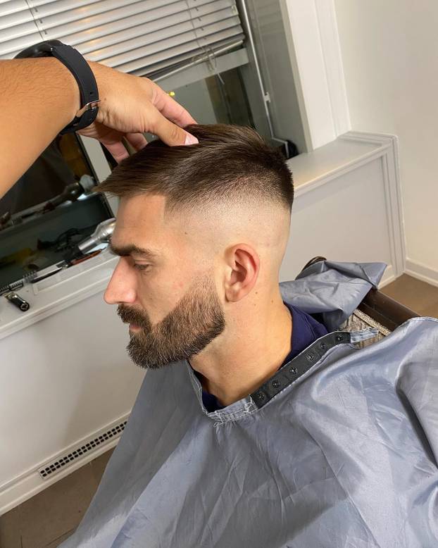 FOTO Tko je brijač 'vatrenih'? Uspio je nagovoriti Modrića na promjenu: 'Perišić? Boljelo me'