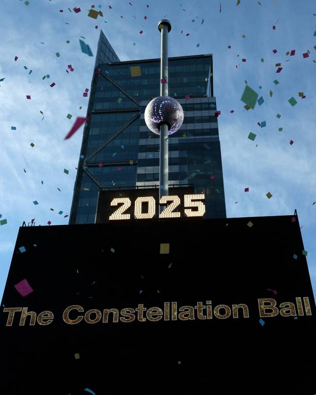 A newly created New Year's eve ball is raised for the first time above One Times Square ahead of the New Year's Eve ball drop in New York