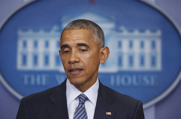 U.S.  President Obama pauses during news conference at the White House in Washington