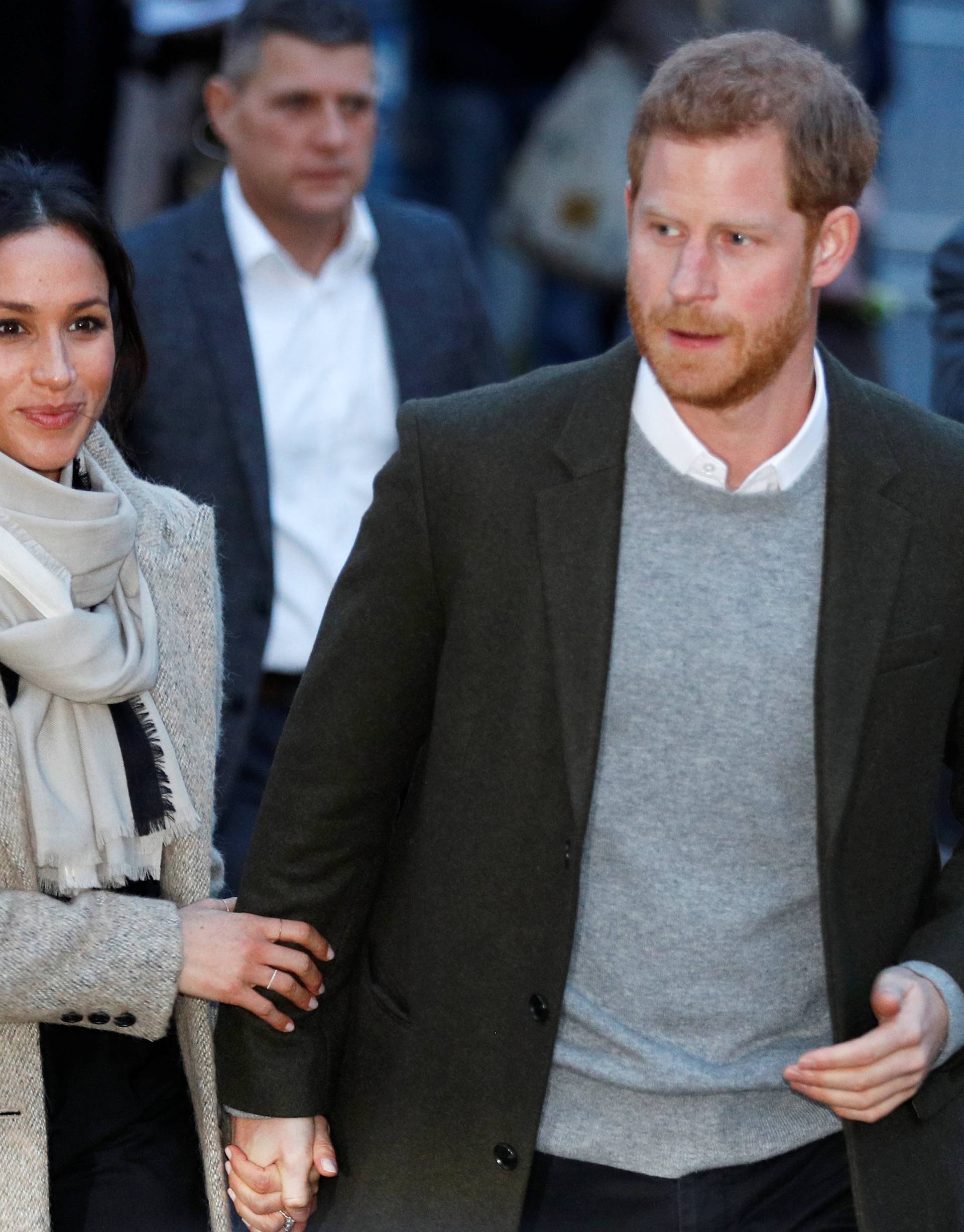 Britain's Prince Harry and his fiancee Meghan Markle leave after visiting radio station Reprezent FM, in Brixton, London