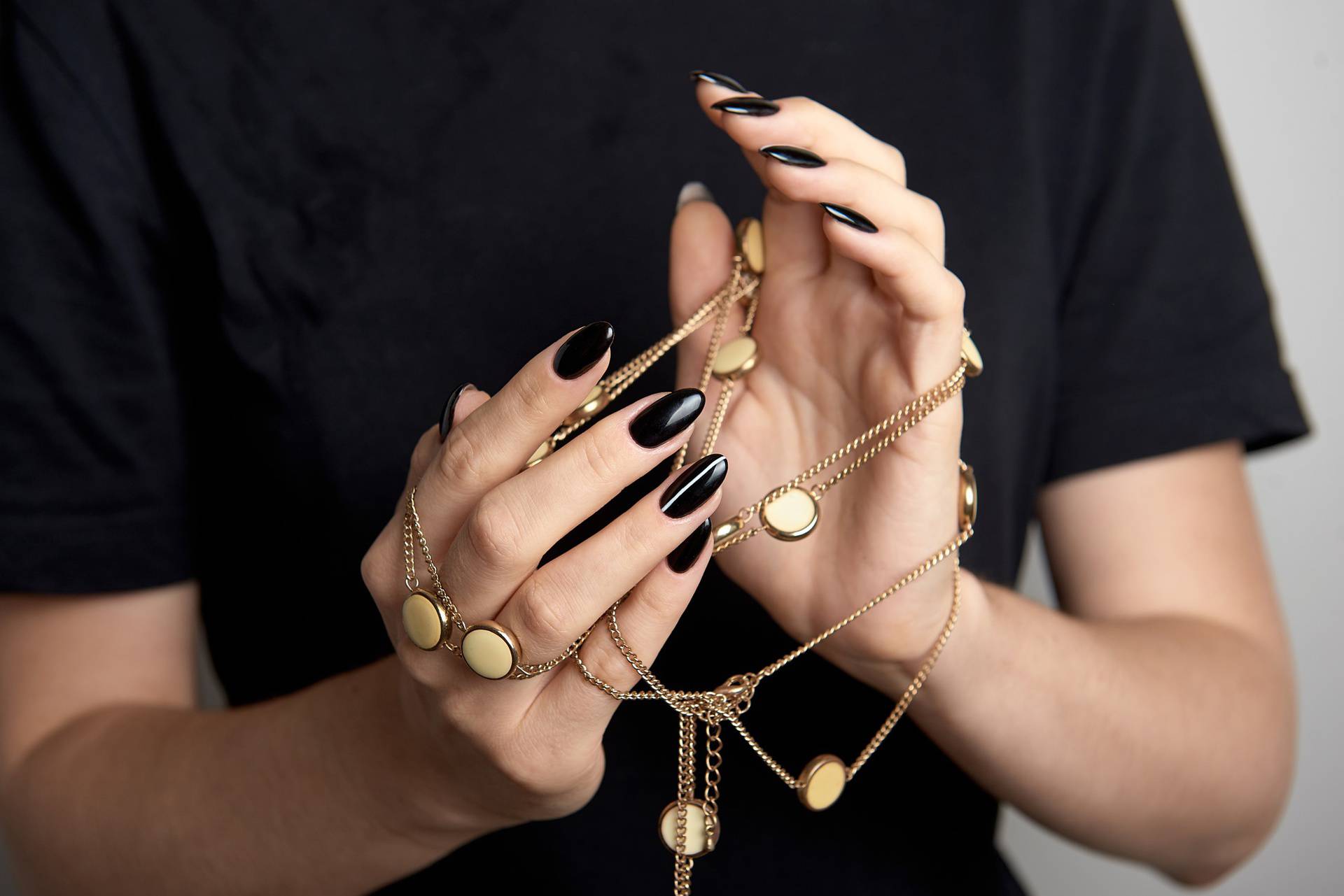 Women's,Hands,With,A,Colorful,Pattern,On,The,Nails.,Black