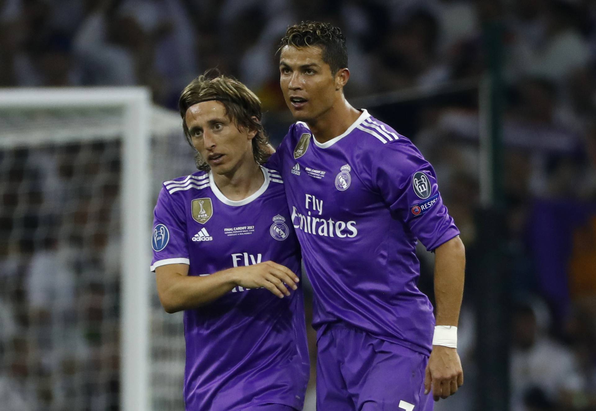 Real Madrid's Cristiano Ronaldo celebrates scoring their third goal with Luka Modric