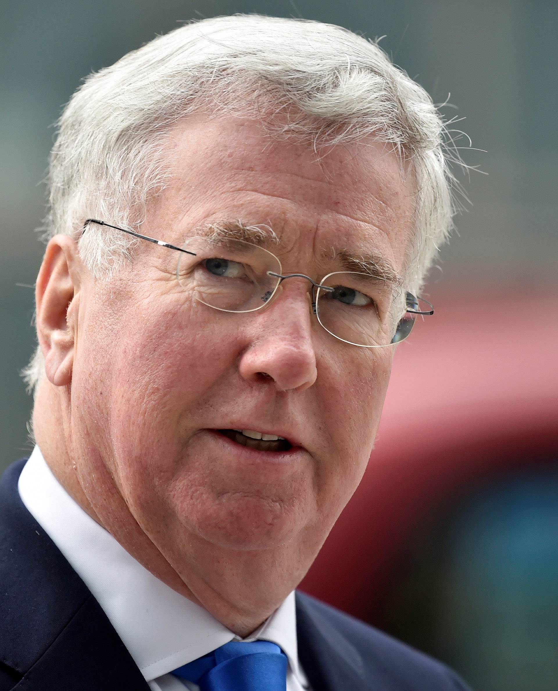 FILE PHOTO: British Defence Secretary Michael Fallon arrives at the National Cyber Security Centre in London