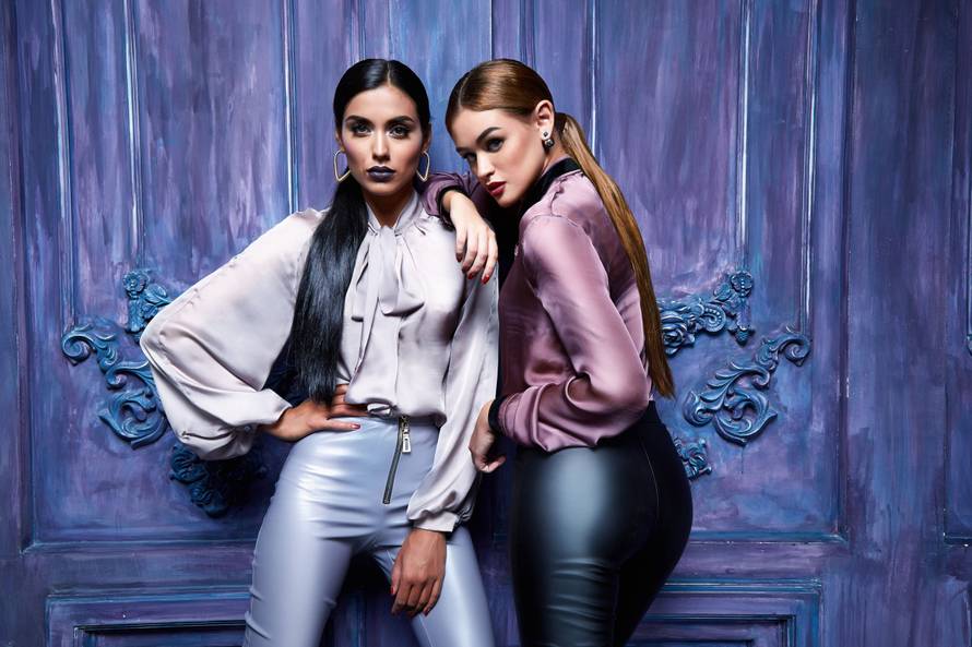 Beautiful sexy young business woman hair evening makeup wearing dress suit top skirt high heels shoes business clothes for meetings walks autumn fall collection perfect body shape make-up.