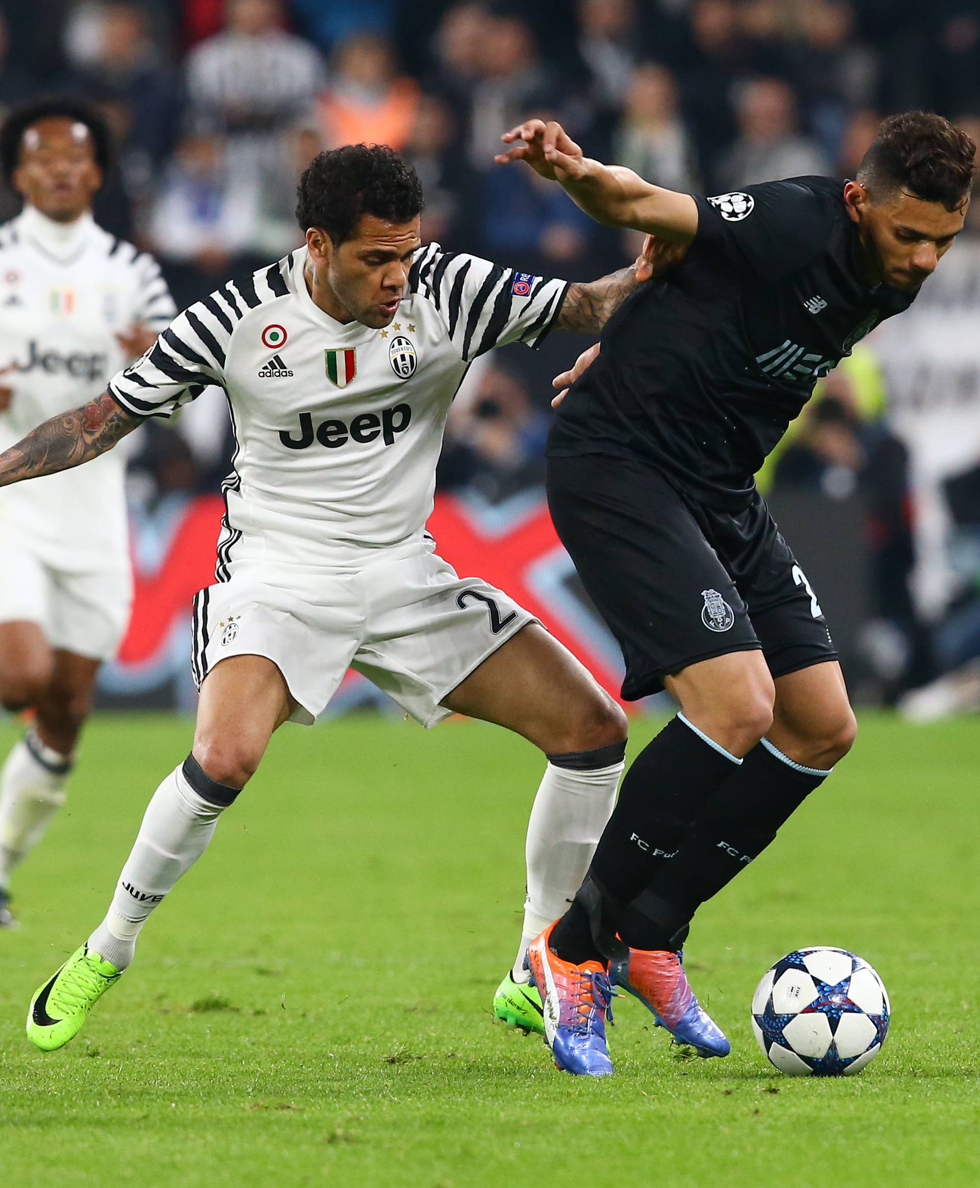 FC Porto's Tiquinho Soares in action with Juventus' Dani Alves