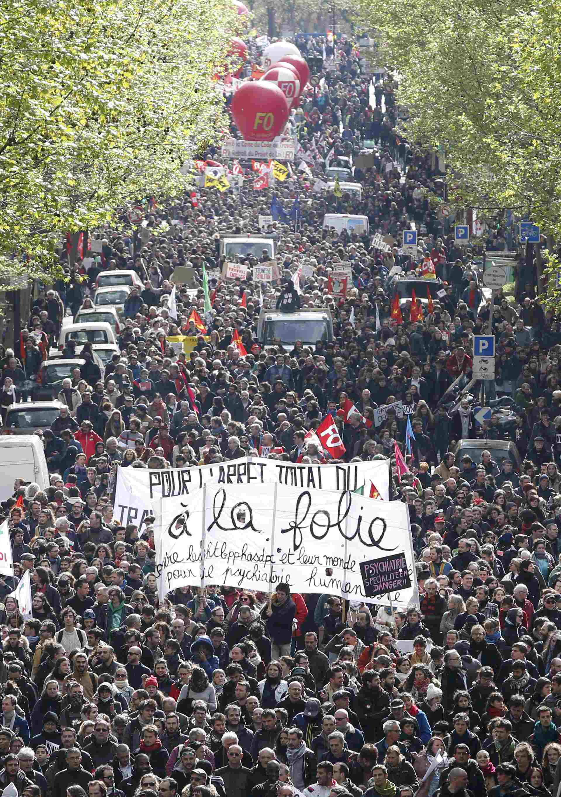 French labour union workers and students attend a demonstration against the French labour law proposal in Paris