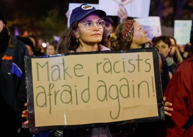 People attend a protest against Freedom Party after general elections in Vienna
