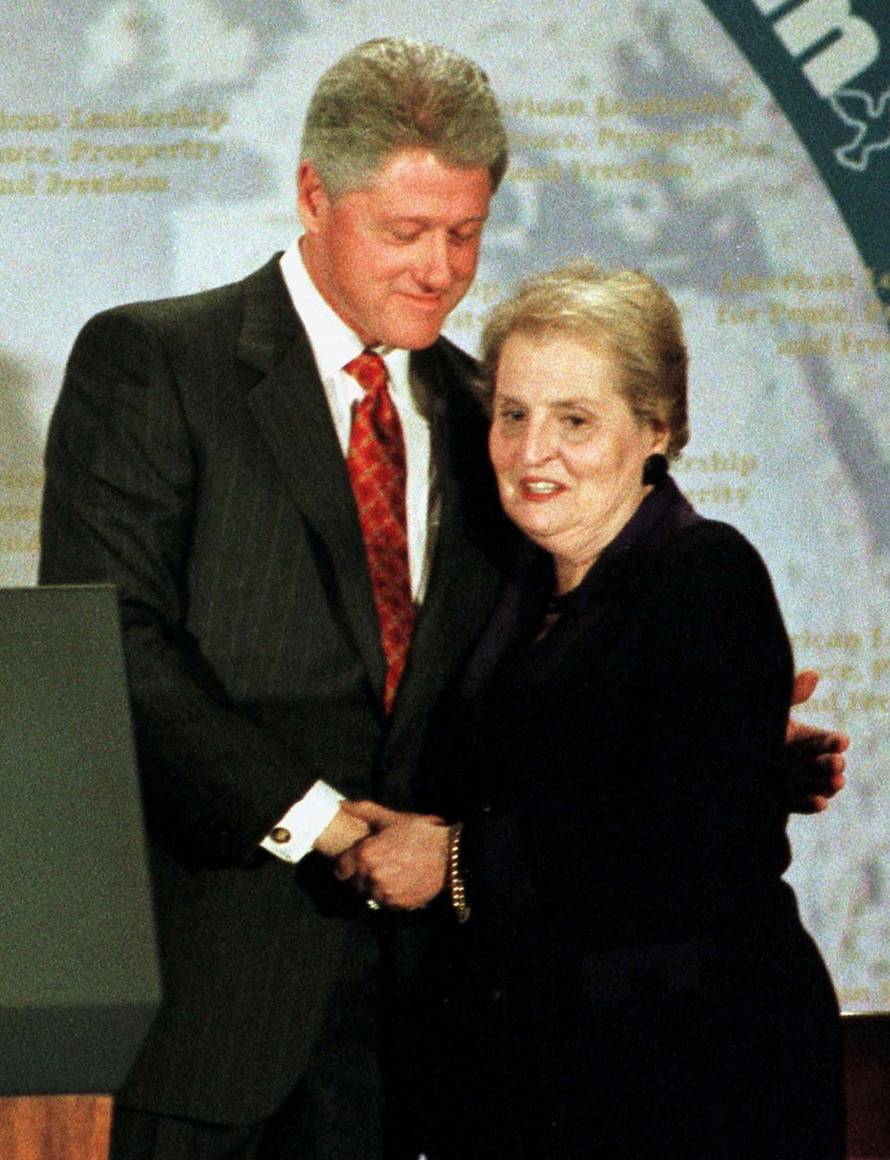 FILE PHOTO: PRESIDENT CLINTON EMBRACES MADELEINE ALBRIGHT AFTER SPEECH.
