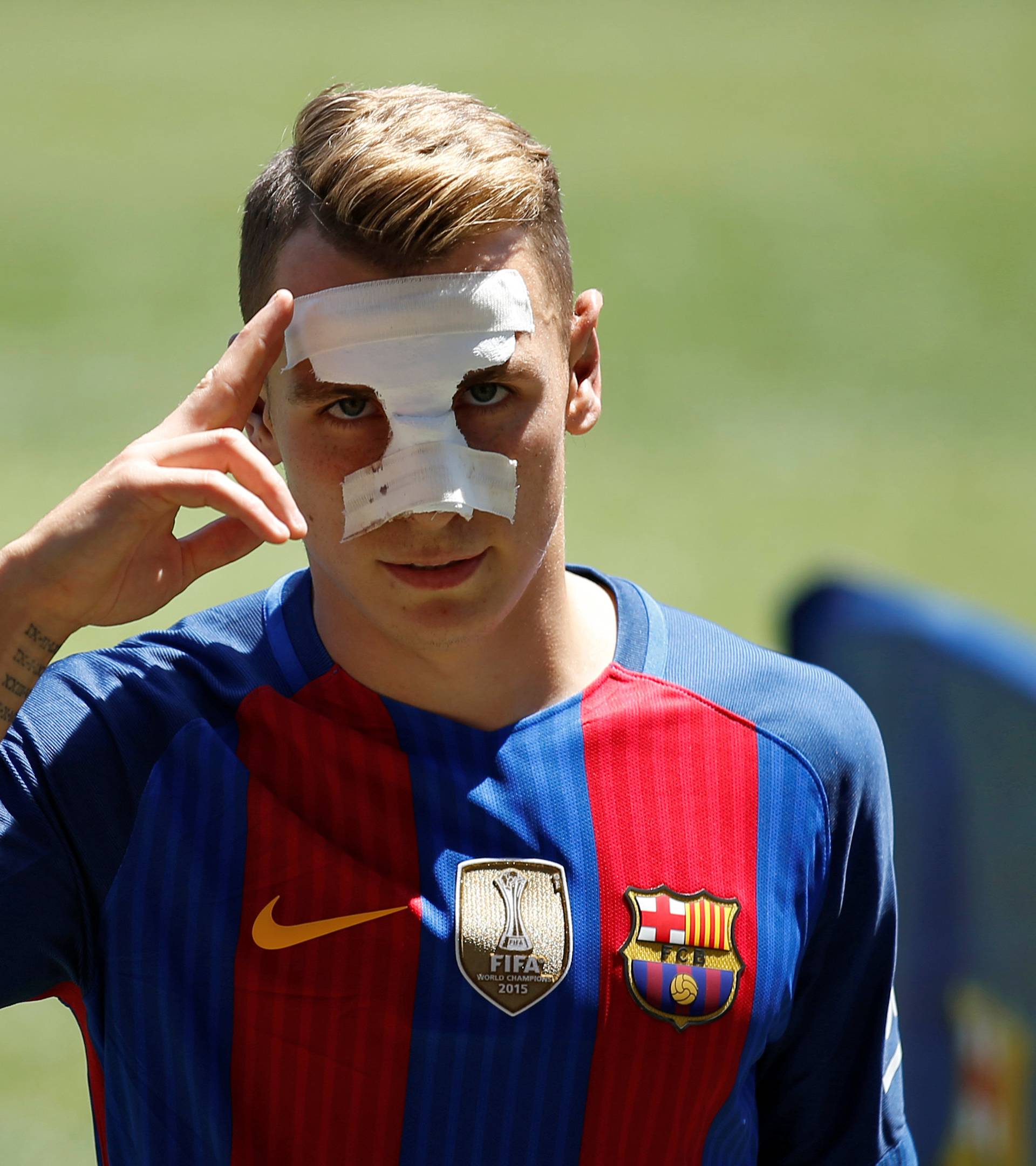 FC Barcelona's newly signed soccer player Lucas Digne salutes during his presentation at Camp Nou stadium in Barcelona