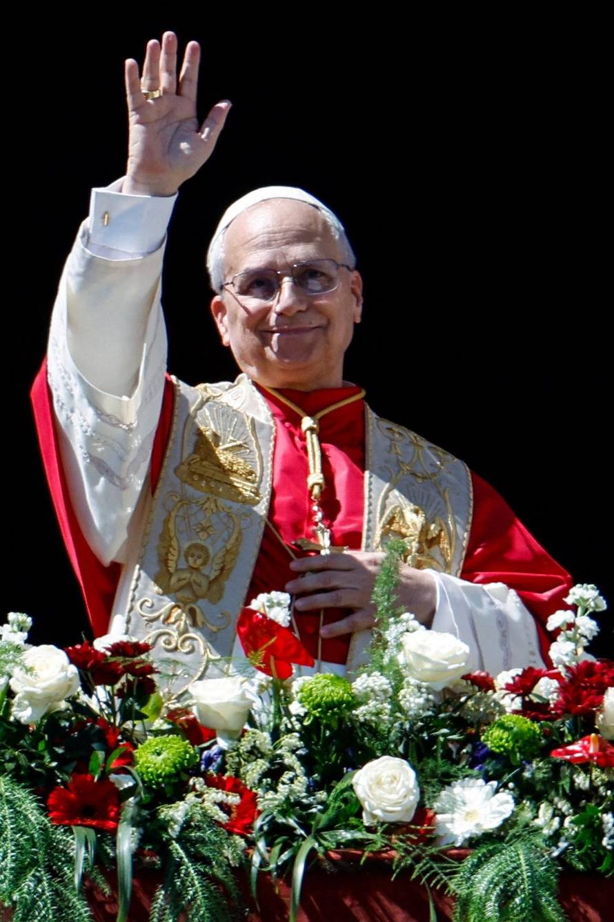 Pope Leo XIV delivers his "Urbi et Orbi" (To the city and the world) message from the main balcony of St. Peter's Basilica