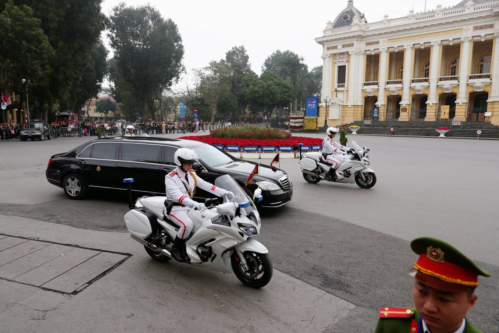 The motorcade transporting North Korean leader Kim Jong Un passes the Opera House after leaving the Metropole Hotel after his meeting with U.S. President Donald Trump for the second North Korea-U.S. summit in Hanoi