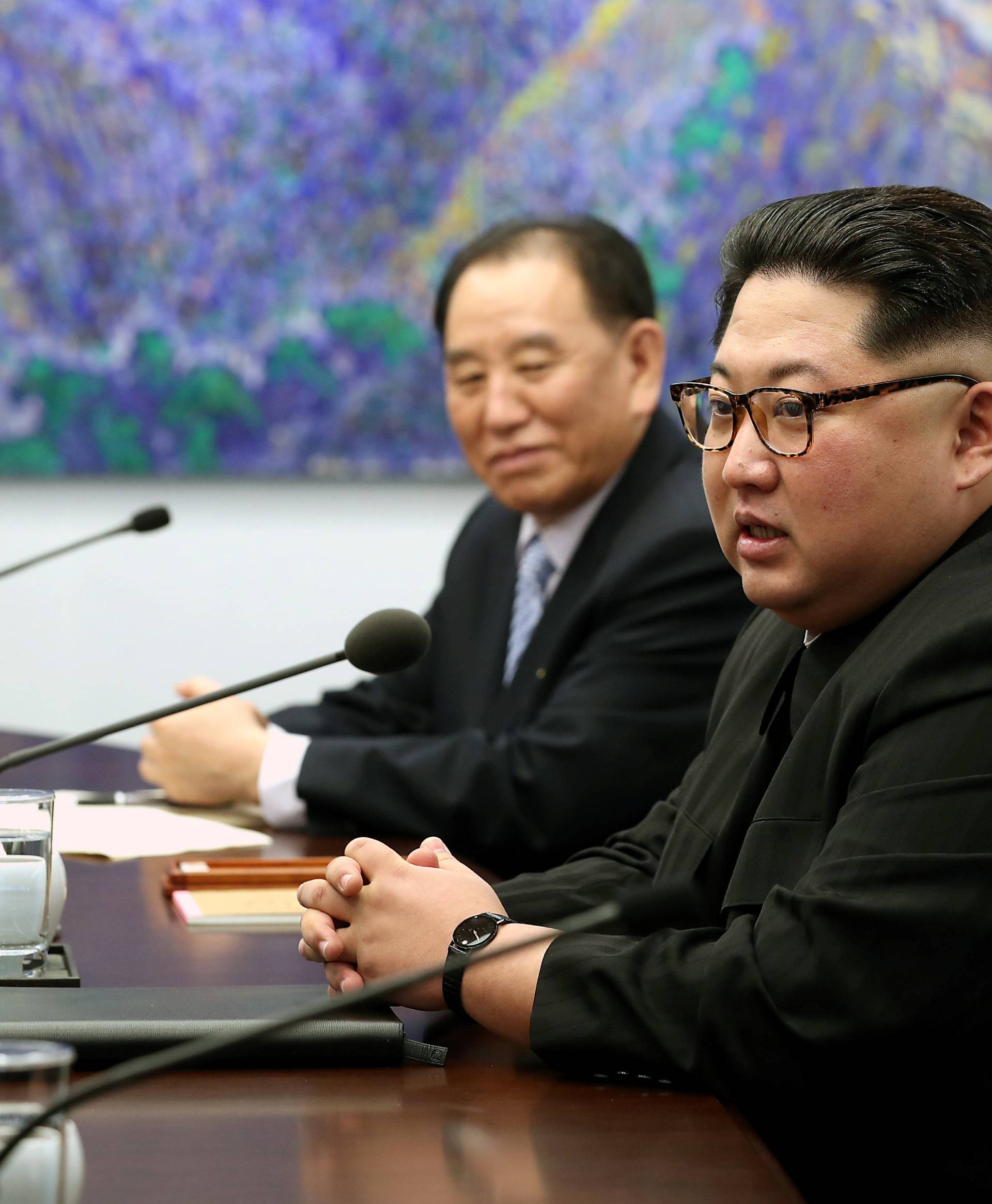 North Korean leader Kim Jong Un talks during a meeting with South Korean President Moon Jae-in at the Peace House