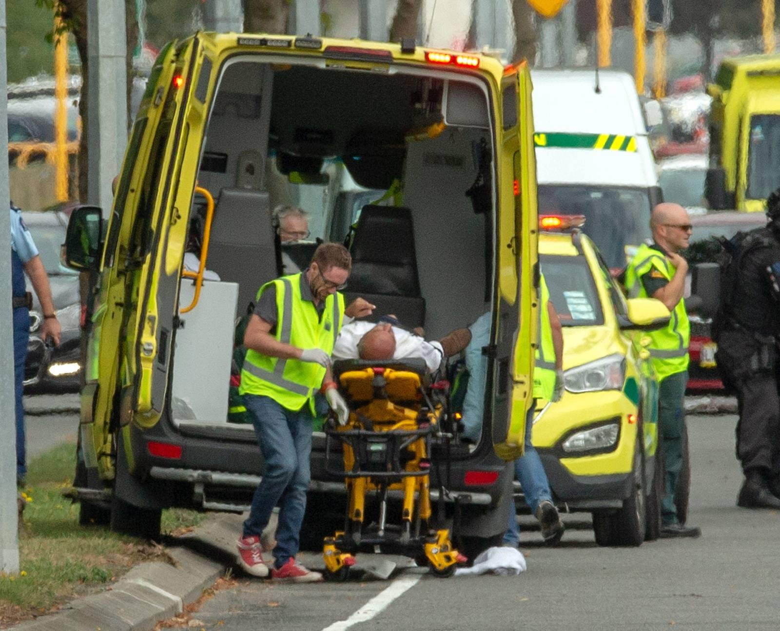 An injured person is loaded into an ambulance following a shooting at the Al Noor mosque in Christchurch