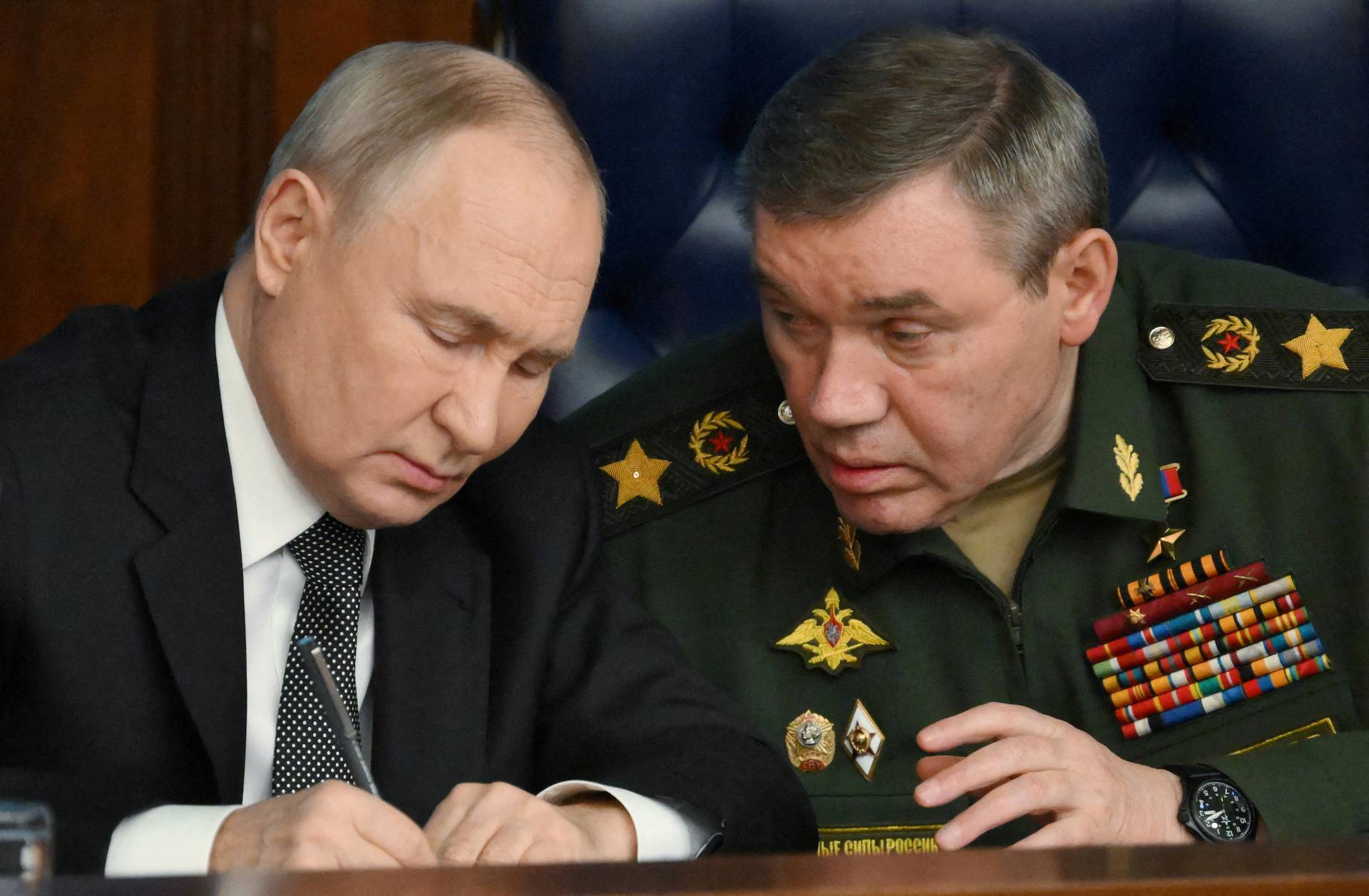 FILE PHOTO: Russian President Vladimir Putin attends a meeting of the Defence Ministry Board in Moscow