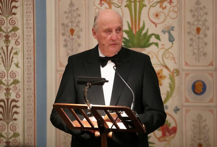 FILE PHOTO: King Harald V of Norway makes a speech at a dinner with Britain's Prince William, Catherine, Duchess of Cambridge, and Queen Sonja of Norway at the Royal Palace in Oslo