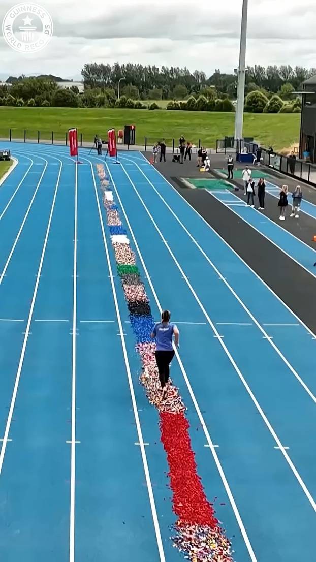 VIDEO: Woman breaks bizarre world record for fastest 100m run barefoot over LEGO