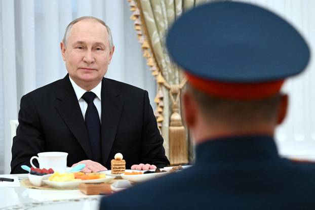 Russian President Putin meets with servicemen involved in Russia-Ukraine conflict, in Moscow