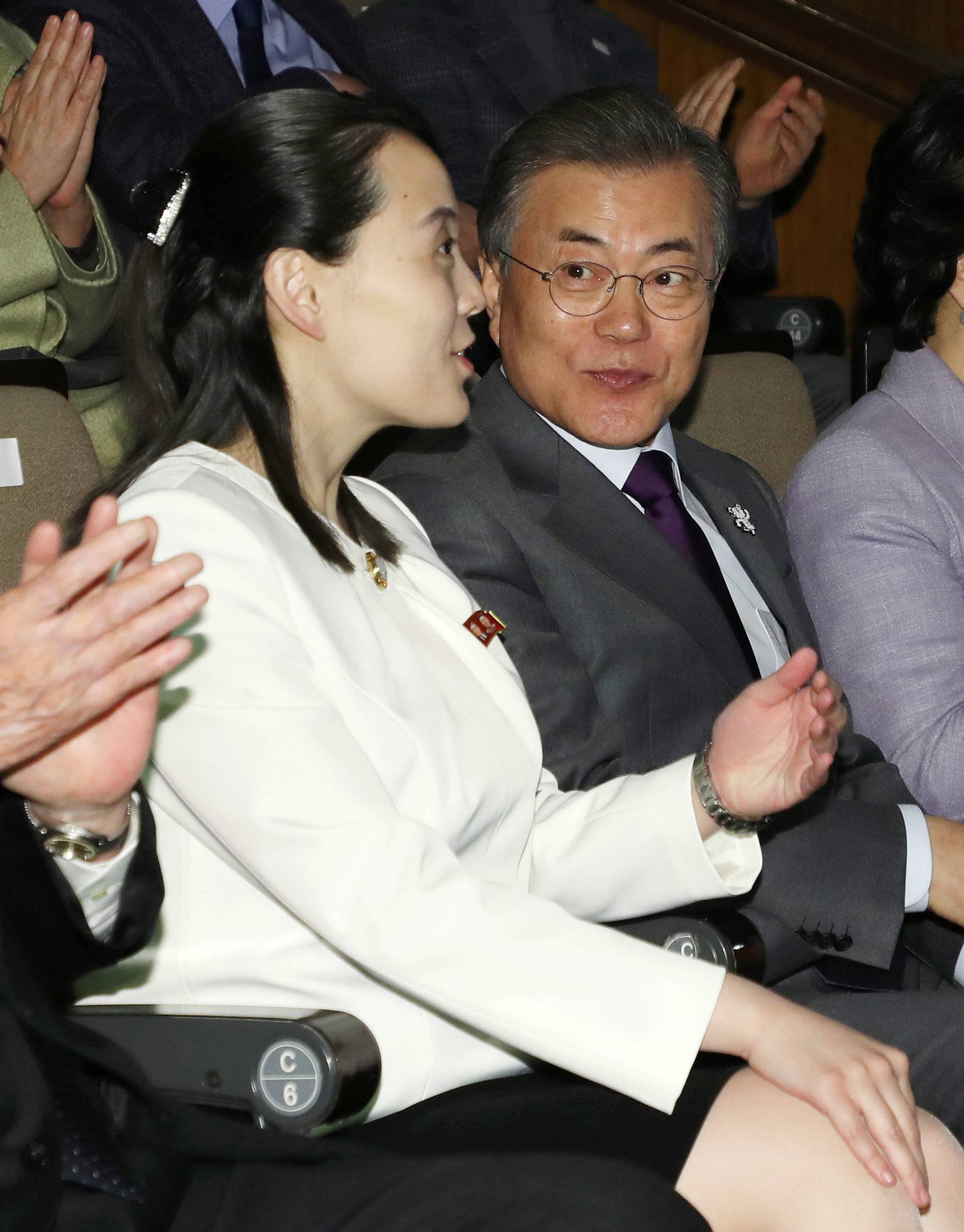South Korean President Moon Jae-in talks with Kim Yo Jong, the sister of North Korea's leader Kim Jong Un, while watching North Korea's Samjiyon Orchestra's performance in Seoul