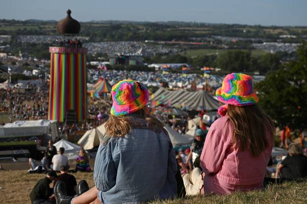 Revellers attend Glastonbury Festival at Worthy Farm in Pilton, Somerset, Britain