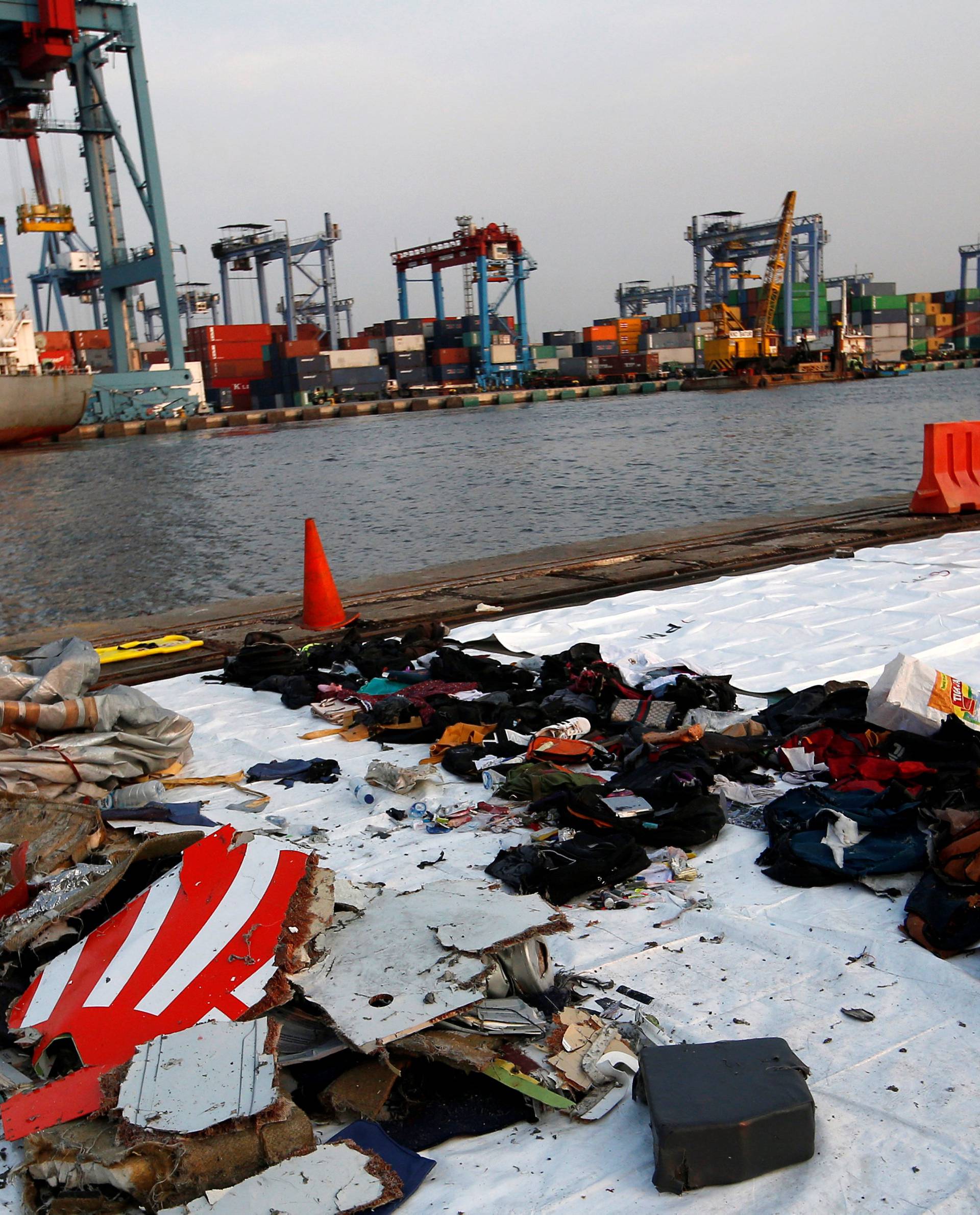 Wreckage recovered from Lion Air flight JT610, that crashed into the sea, lies at Tanjung Priok port in Jakarta