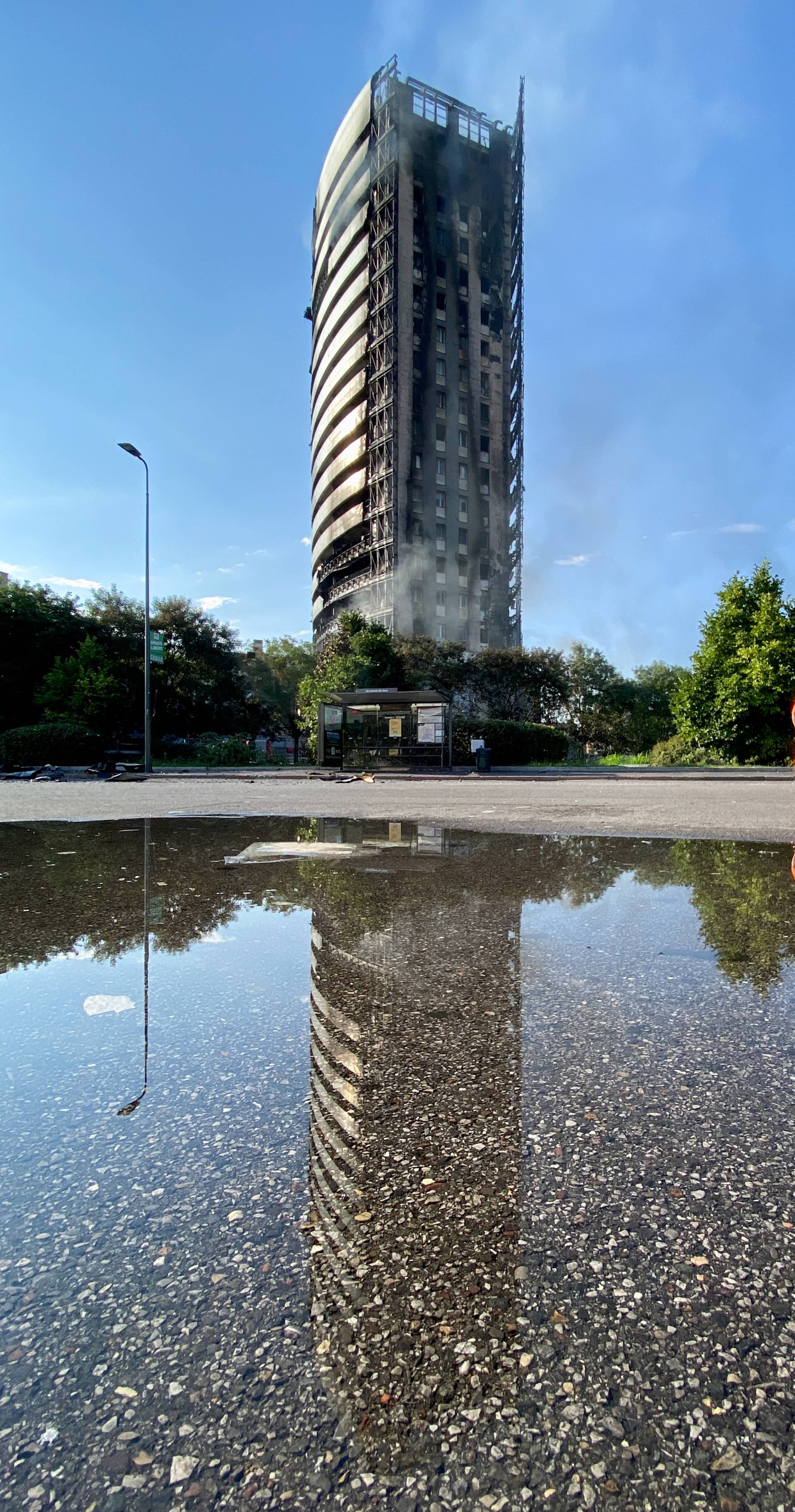 Fire rages through Milan's residential tower block