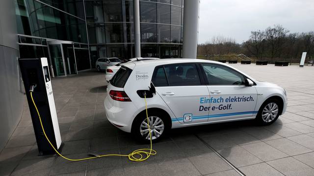 FILE PHOTO: VW e-Golf electric car charges outside the Transparent Factory in Dresden