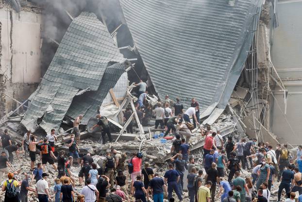 Rescuers work at Ohmatdyt Children's Hospital that was damaged during a Russian missile strikes, in Kyiv