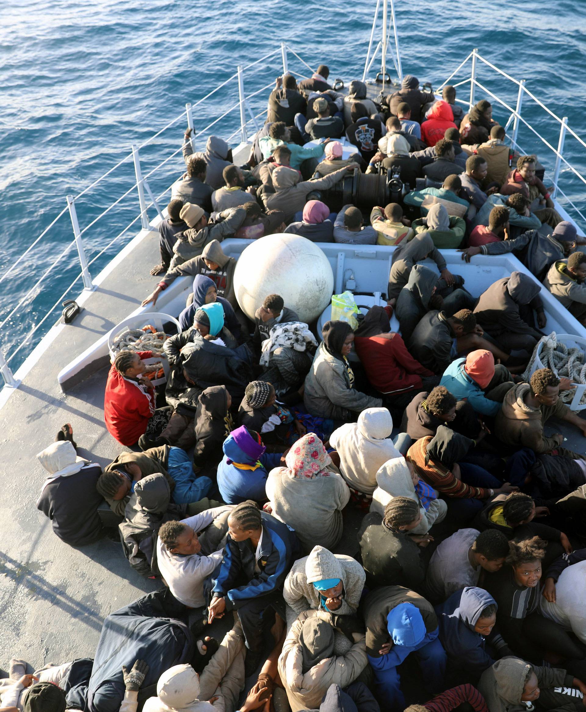 Migrants are rescued by Libyan coast guards off the coast of Garabulli