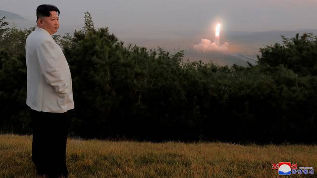 FILE PHOTO: FILE PHOTO: North Korea's leader Kim Jong Un oversees a missile launch at an undisclosed location in North Korea
