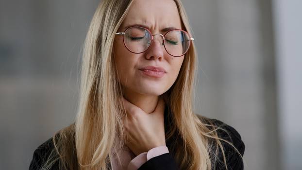 Caucasian,Business,Woman,Girl,In,Glasses,Worker,Manager,Holding,Throat