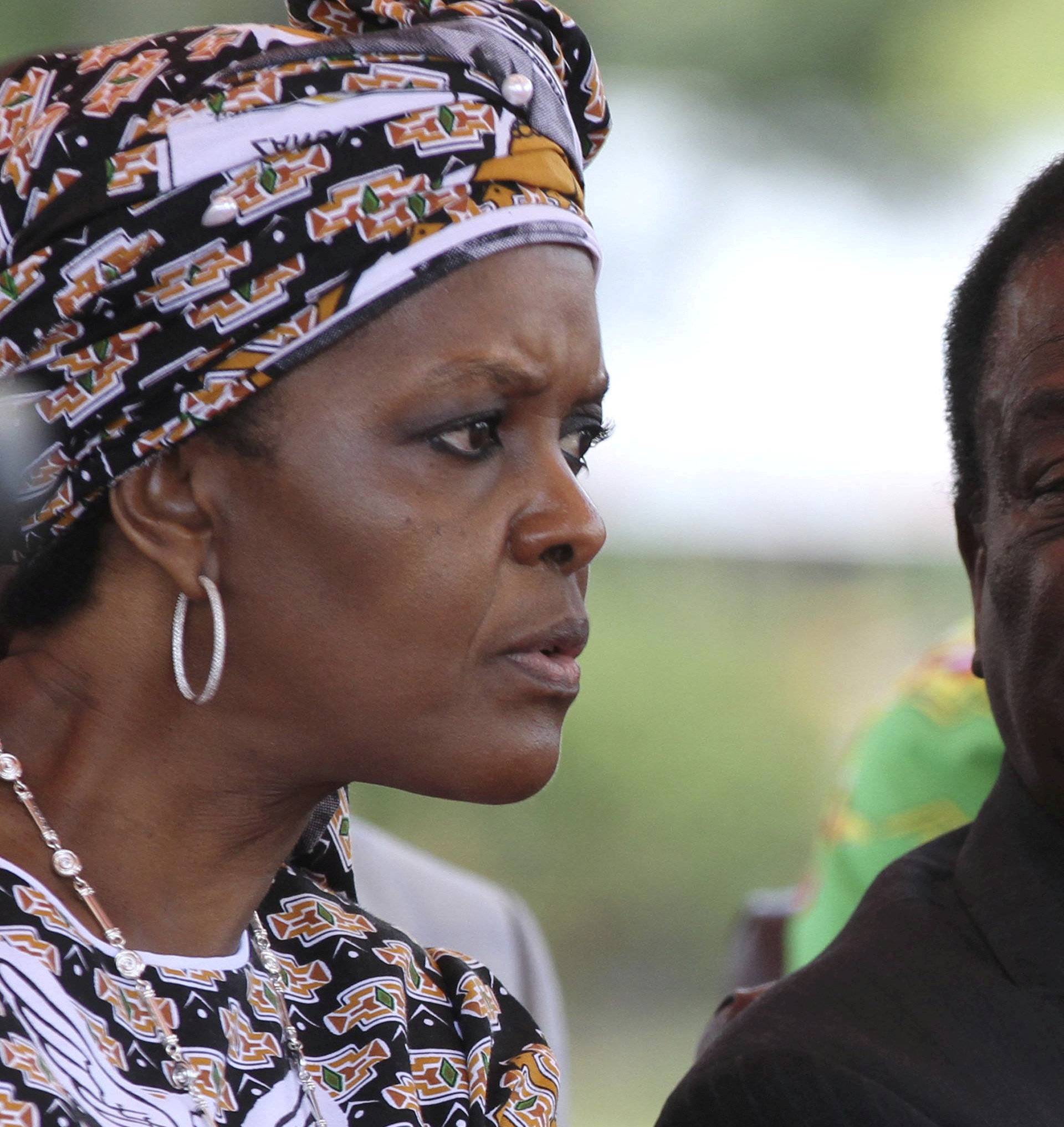FILE PHOTO: President Robert Mugabe's wife Grace Mugabe and VP Mnangagwa attend a gathering of the ZANU-PF party's top decision making body, the Politburo, in the capital Harare