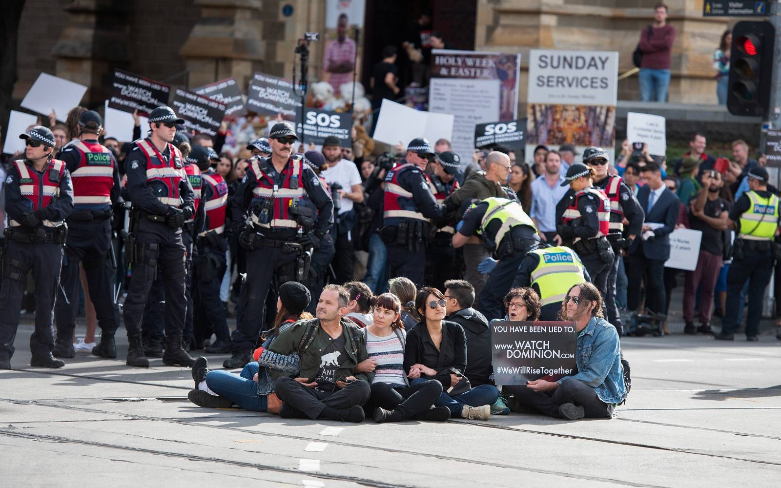 Police move in on animal rights protesters who had blocked the intersections of Flinders and Swanston Street, in Melbourne