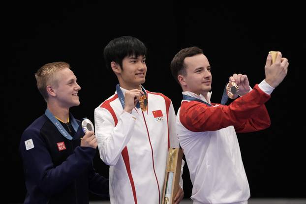 Shooting - 10m Air Rifle Men's Victory Ceremony