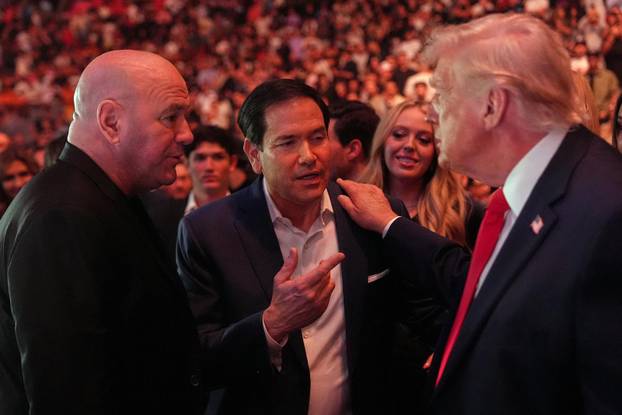 U.S. President Donald Trump attends UFC 327 at Kaseya Center