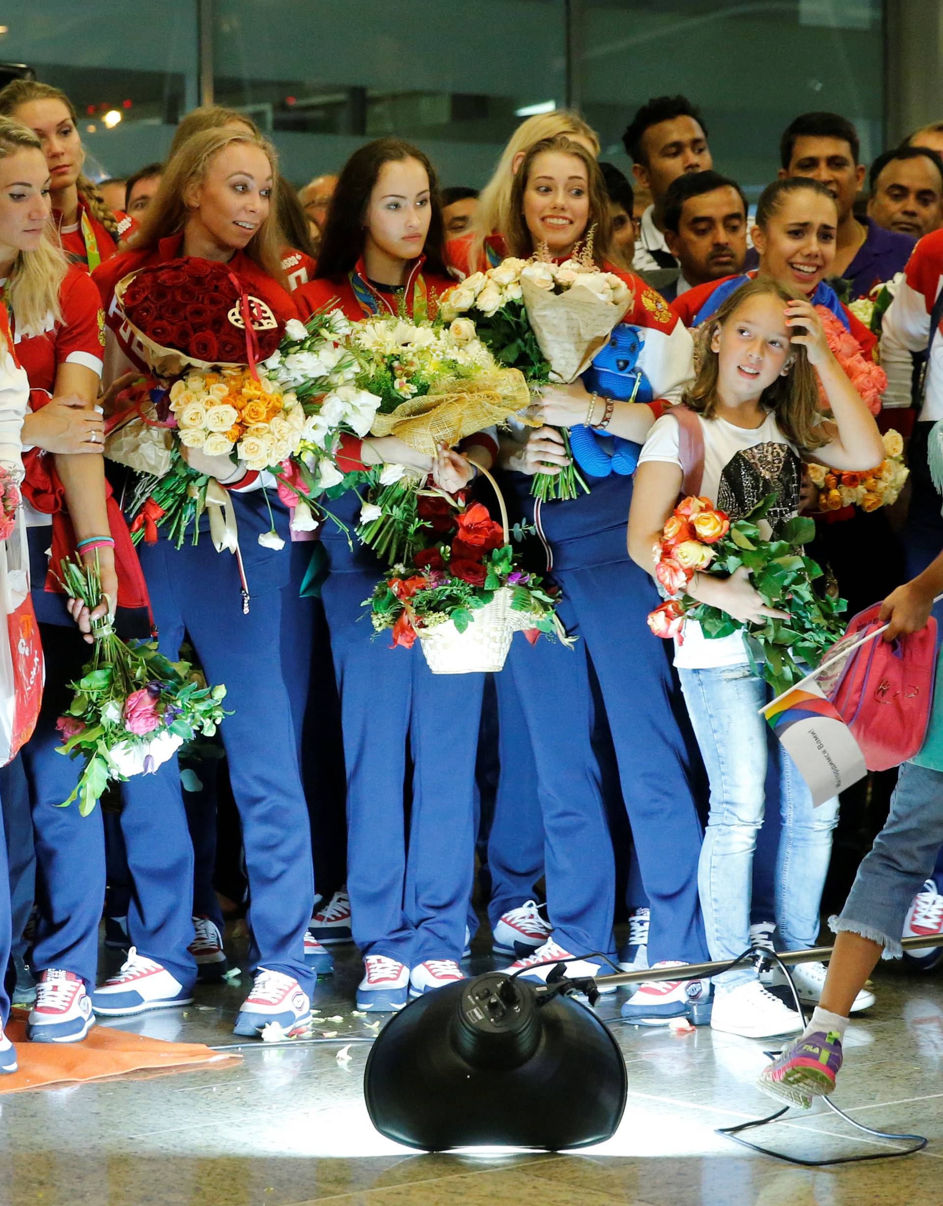 Members of Russian Olympic team attend welcoming ceremony as they return home from 2016 Rio Olympics at Moscow's Sheremetyevo Airport