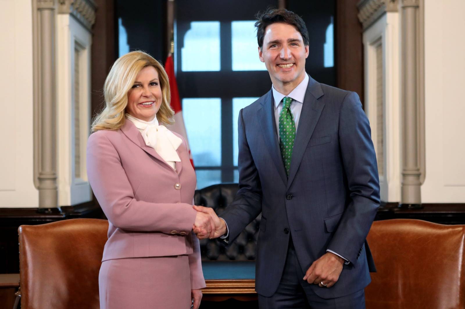 Canada's PM Trudeau shakes hands with Croatia's President Grabar-Kitarovic on Parliament Hill in Ottawa