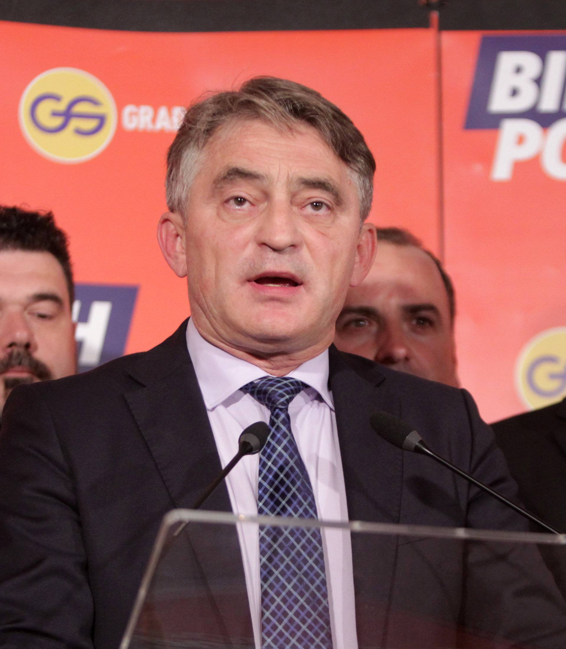 Zeljko Komsic of Democratic Front (DF) attends a news conference where he declared himself the winner of the Croat seat of the Tri-partite Bosnian Presidency in Sarajevo