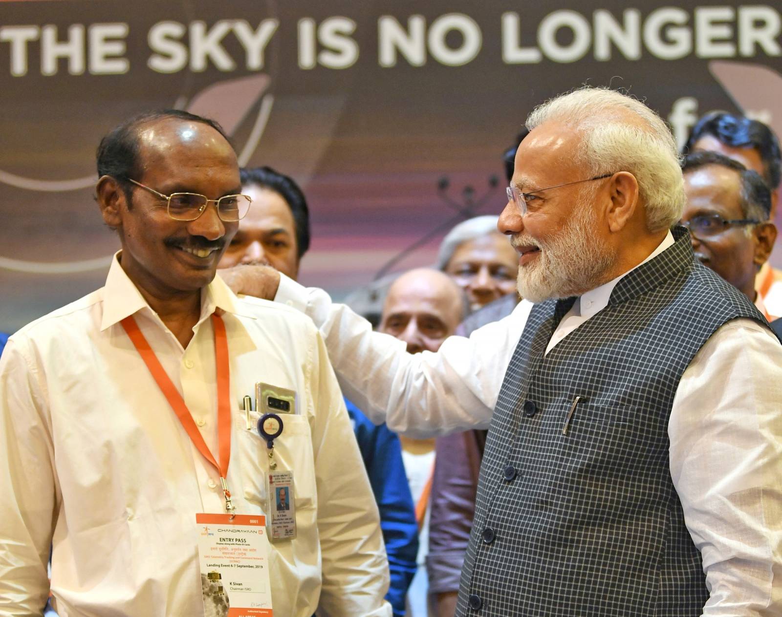 India's Prime Minister Narendra Modi talks to Kailasavadivoo Sivan, chairperson of the Indian Space Research Organization (ISRO) at their headquarters in Bengaluru