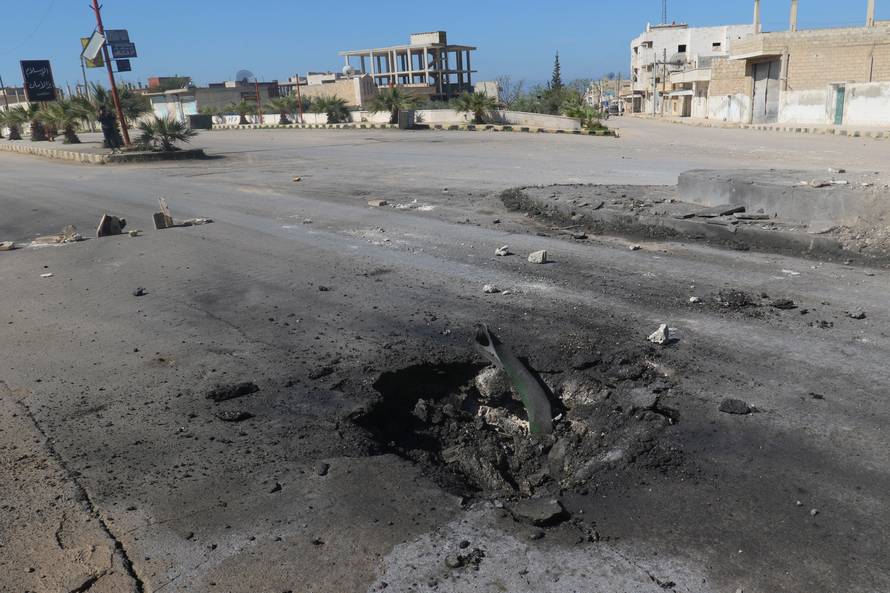 A crater is seen at the site of an airstrike, after what rescue workers described as a suspected gas attack in the town of Khan Sheikhoun in rebel-held Idlib