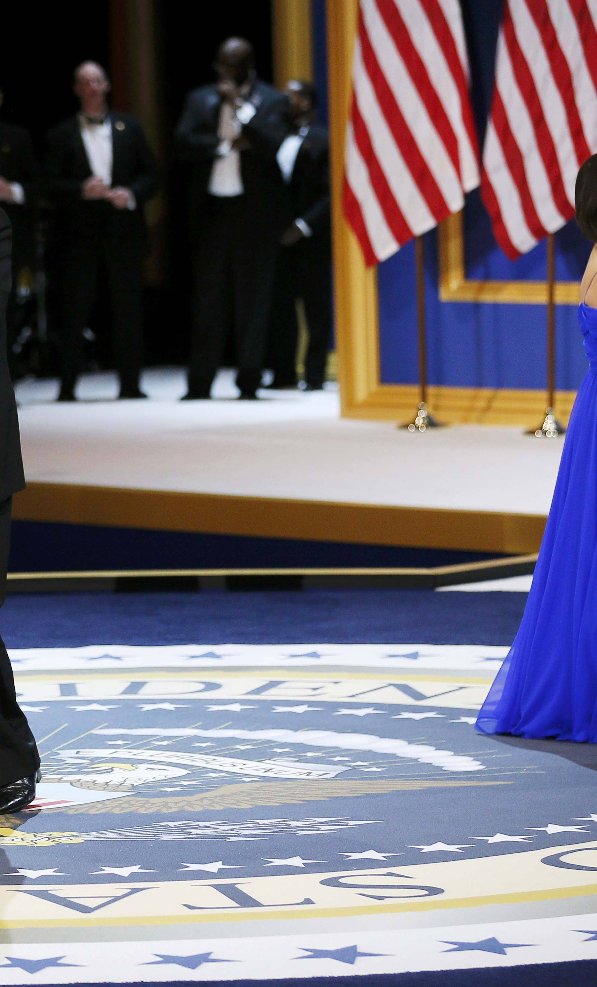 U.S. President Donald Trump and his wife first lady Melania Trump dance with Vice President Mike Pence and his wife Karen at the "Salute to Our Armed Forces" inaugural ball during inauguration festivites in Washington