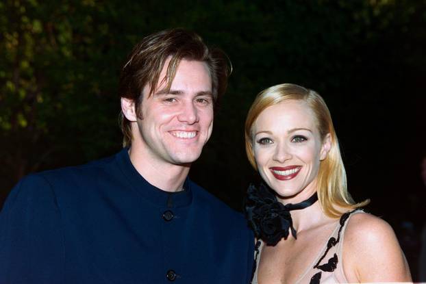 LOS ANGELES, CA. c.1995: Actor Jim Carrey & Lauren Holly.  File photo  Paul Smith/Featureflash