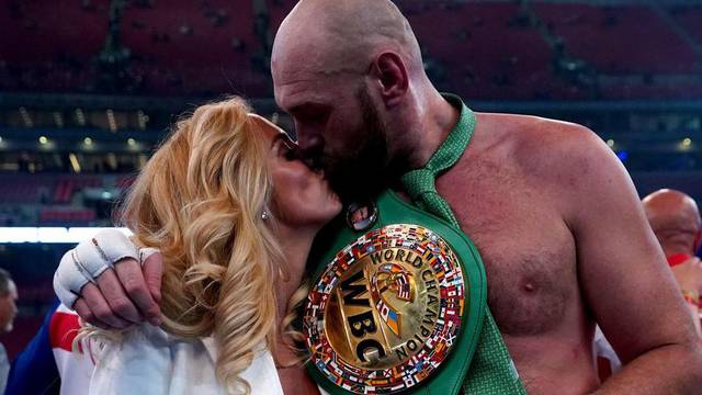 Tyson Fury with his wife Paris following victory over Dillian Whyte at Wembley Stadium, London. Picture date: Saturday April 23, 2022.