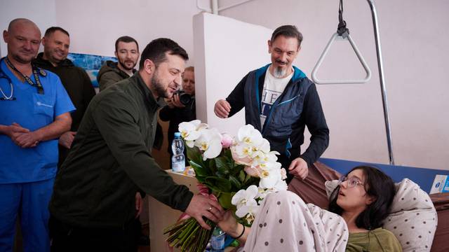 Ukraine's President Zelenskiy meets injured people at a hospital in Kyiv