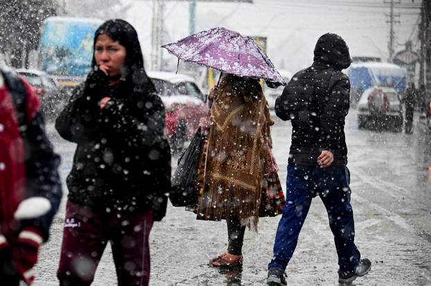Snow falls amid low temperatures in Bolivia, in El Alto