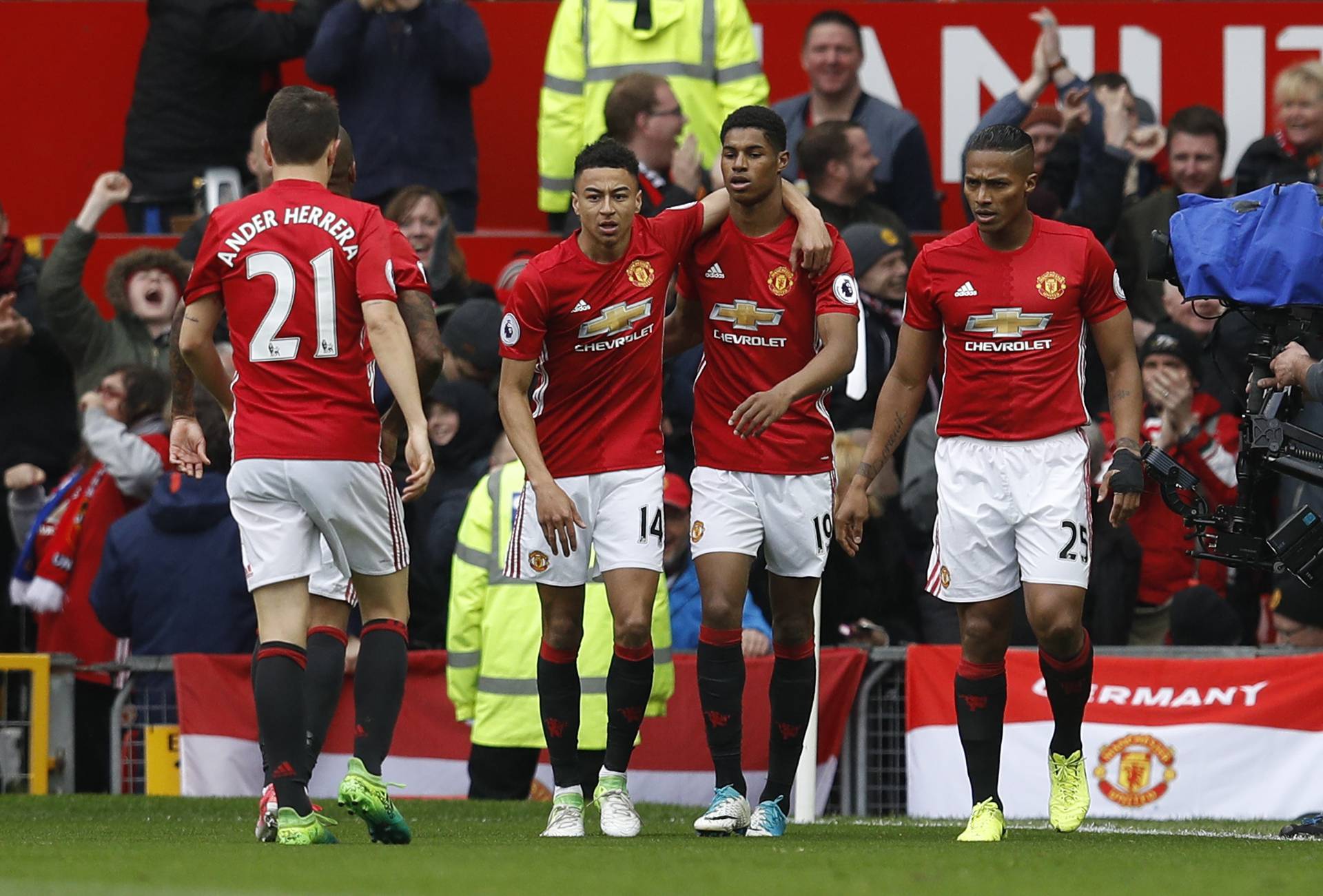 Manchester United's Marcus Rashford celebrates scoring their first goal with team mates