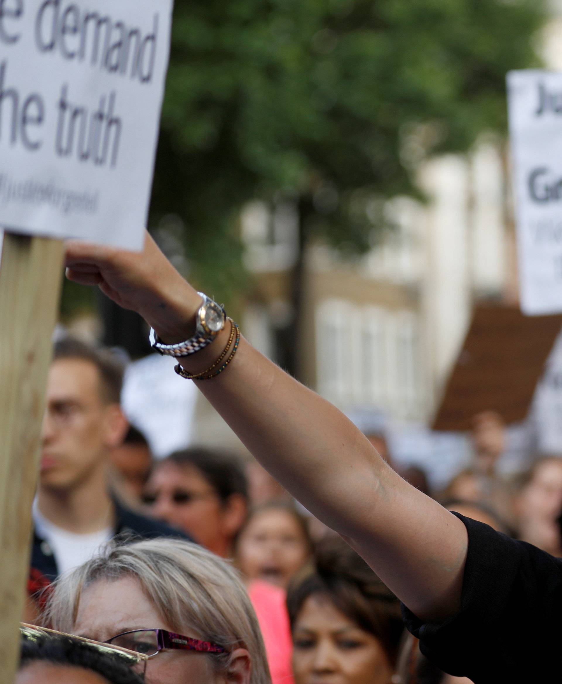 Demonstrators shhout during a march in Westminster, following the fire that destroyed The Grenfell Tower block, in north Kensington, West London